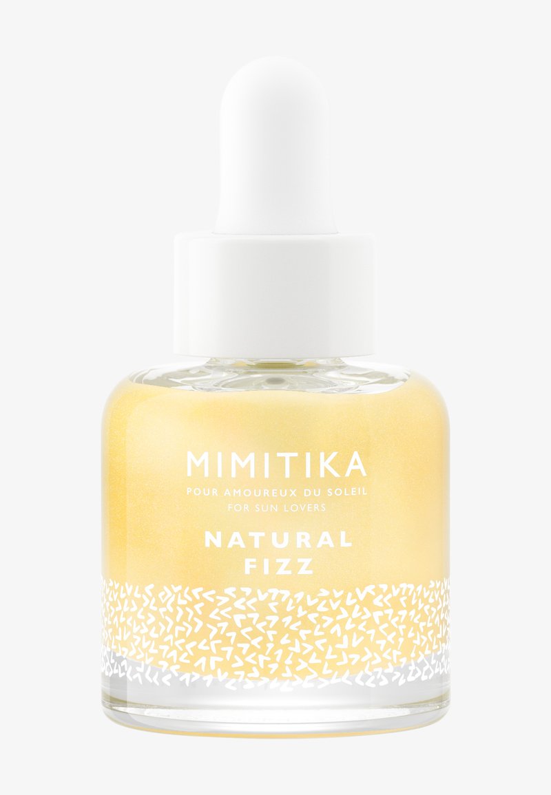 Glas-Tropfflasche mit weißem Verschluss, beschriftet mit Mimitika Natural Fizz, enthält gelbe Flüssigkeit mit weißem dekorativem Muster.