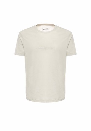 T-shirt in cotone beige chiaro con maniche corte, scollatura rotonda e logo in rilievo "USPA Sport" sul davanti. Design semplice e classico.