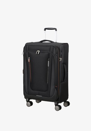 Valigia nera in soft-shell con manico telescopico, maniglie laterali e superiori, tasca frontale con zip e quattro ruote girevoli per una facile mobilità.