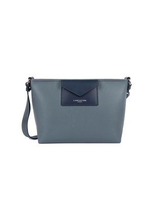 Gray leather crossbody bag with a textured finish, featuring a navy accent flap and silver hardware. Adjustable strap included.