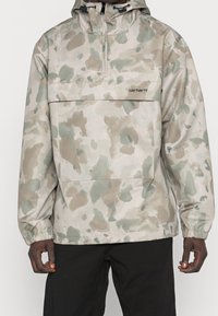 Carhartt WIP Lehká bunda - beige