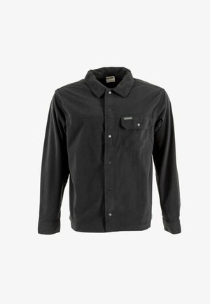 Schwarzes Cordhemd mit langen Ärmeln, einer durchgehenden Knopfleiste und einer einzelnen Brusttasche mit einem kleinen Logo. Texturiertes Material mit vertikalen Rippungen.