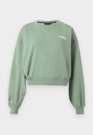 Hellgrünes, kurz geschnittenes Sweatshirt mit langen Ärmeln, gerippten Bündchen und Saum sowie kleinem "Red Bull Racing"-Schriftzug auf der Brust und am Ärmel.