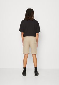 Alpha Industries X-FIT - Tepláky - vintage sand