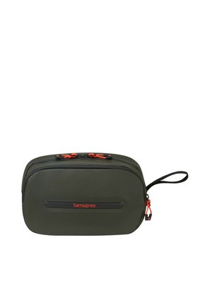 Kompakte dunkelgrüne Samsonite-Kulturtasche mit zwei Reißverschlussfächern, roten Reißverschlusslaschen und einem schwarzen Handgelenkriemen an der Seite.