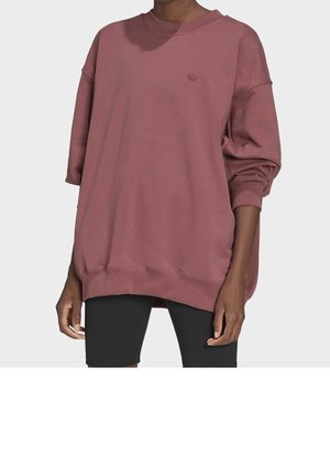 Oversized bordeauxrode sweatshirt van zachte stof, met een ronde hals, verlaagde schouders en een klein logo op de borst.