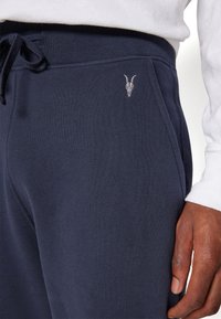 AllSaints RAVEN PANT - Pantalones deportivos - cadet blue