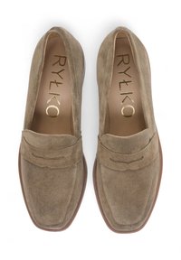 Brown suede loafers with a square toe, featuring a subtle stitched detail and a smooth brown sole. Gold logo inscription inside.