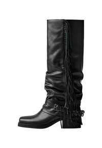 Black leather knee-high boots with slouchy design, side fringe details, a buckled strap, and a slightly curved block heel.