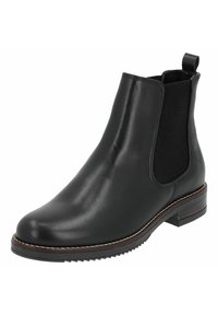 Botín chelsea de cuero negro con paneles elásticos laterales, punta redonda, detalle texturizado y suela resistente. Presenta una tira en la parte trasera.