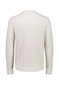 Lichtbeige gebreide sweater met ribbeltextuur, lange mouwen en een ronde halslijn. Kenmerkt zich door een ontspannen pasvorm en een licht elastische onderkant.