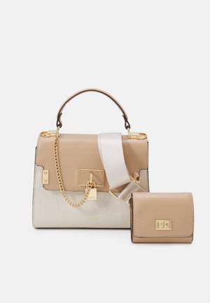Structured handbag in light beige and cream with a crocodile texture. Gold hardware and a detachable strap. Includes a matching small wallet.