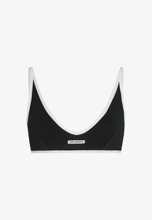 Fekete bralette fehér szegéllyel és vékony pántokkal, középen elöl egy kis téglalap alakú Karl Lagerfeld logó folttal.