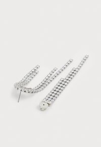 Two silver-tone hairpins decorated with rows of clear rhinestones on a white background.