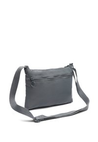 Borsa a tracolla grigia realizzata in tessuto leggero, con una tasca frontale con zip e una tracolla regolabile per maggiore comodità.