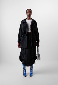 Timberland VENEDA CARTER 2-IN-1 SKIRT - Miniskjørt - black