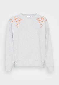Sweatshirt gris clair en tissu mélangé, avec broderies florales orange sur les épaules, col rond et poignets côtelés.