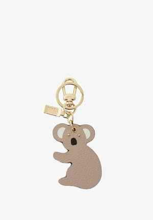 Portachiavi con ciondolo koala in pelle beige e anello e moschettone in metallo dorato, incluso un piccolo tag dorato con testo inciso.