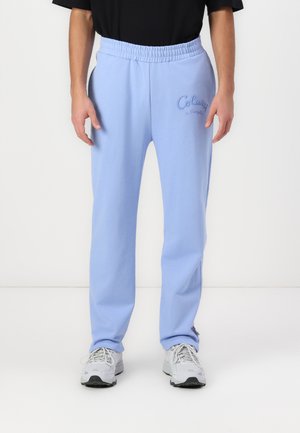 JOGGPANTS - Tracksuit bottoms - blue