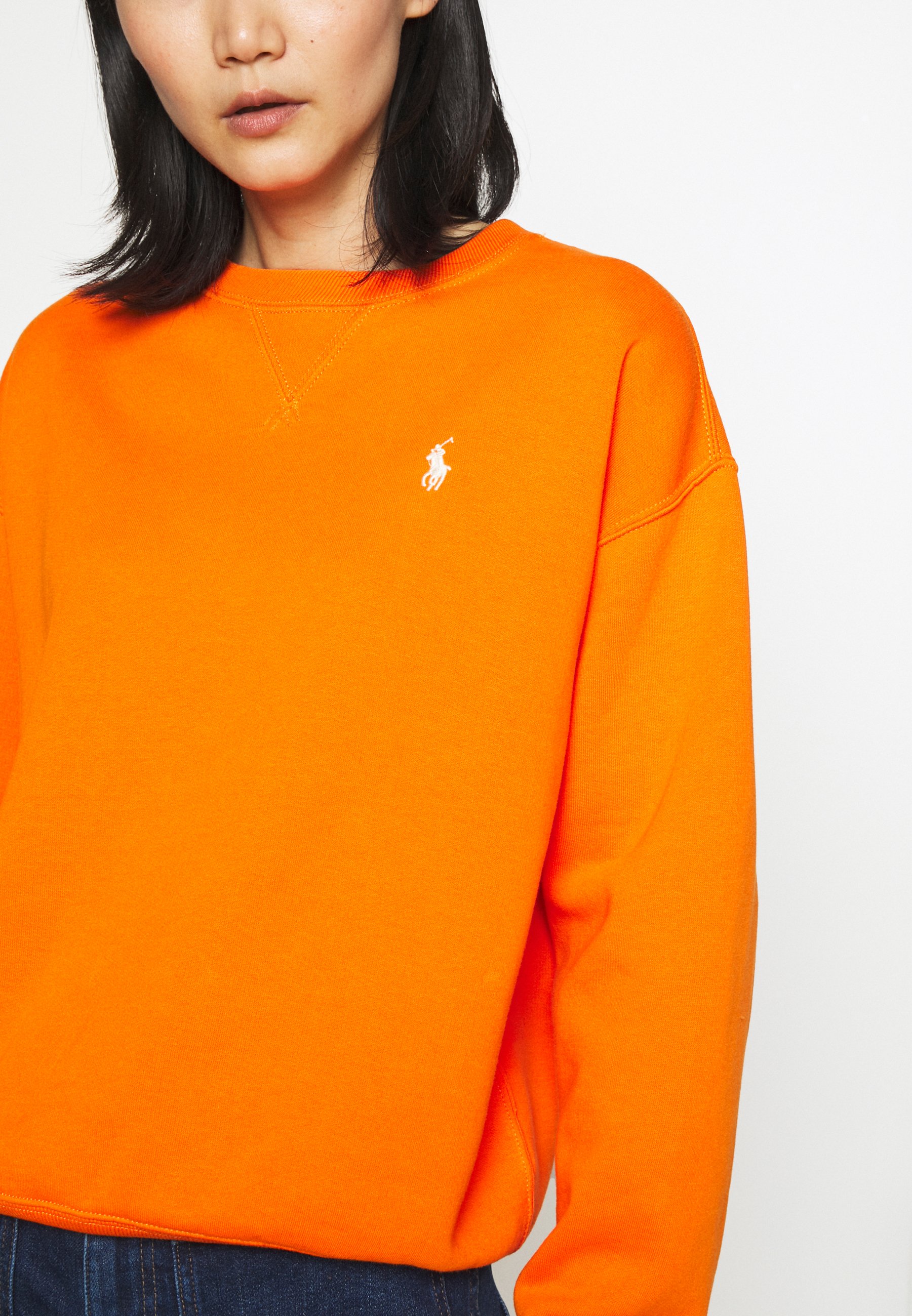 orange polo sweater