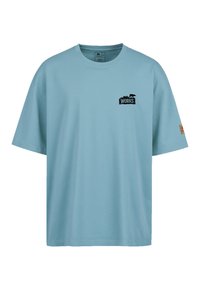 Lichtblauw katoenen T-shirt met een ronde hals, korte mouwen en een klein zwart "WORKS" logo op de linkerkant van de borst; heeft een geweven label op de mouw.