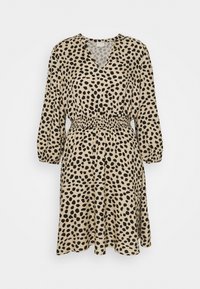 Beige dress with black leopard spots, V-neckline, long puff sleeves, and an elastic waistband for a fitted look. Smooth fabric texture.