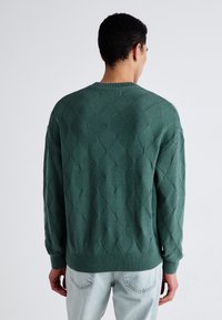 Hollister Co. Boxy Golf Graphic Crew Sweater - Vesta - sea moss ground