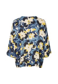 Blusa suelta de manga corta con estampado floral abstracto en azul, amarillo, negro y blanco sobre un fondo claro.