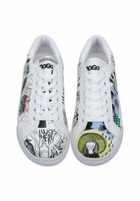 White canvas sneakers featuring an artistic print with black and colorful illustrations, including faces and abstract shapes, on each side.