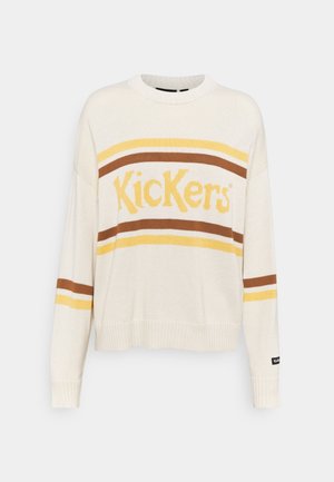Pull en tricot crème avec un col rond, présentant des rayures horizontales marron et jaune, et le logo "Kickers" bien en vue.