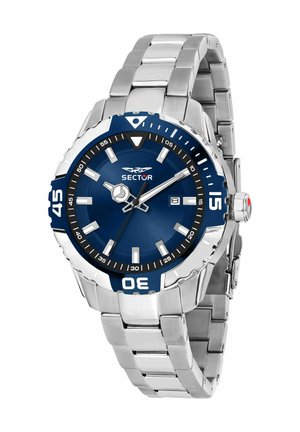 Orologio in acciaio inossidabile argentato con quadrante blu, lancette e indicatori luminosi. Presenta una lunetta girevole e un display della data alle tre.