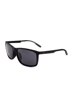 Occhiali da sole rettangolari neri opachi con lenti scure sfumate e aste sottili con un piccolo logo Under Armour sul lato.