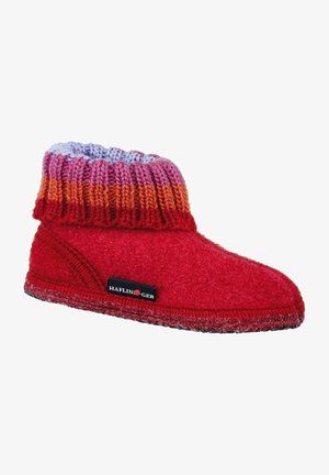 Red wool slipper with a knitted multicolor cuff in shades of purple, orange, and red. Features a black label with "Haflinger" on the side.