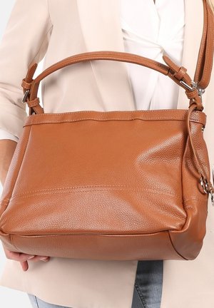Brown leather handbag with a textured surface, rectangular shape, adjustable strap, and a short handle. Silver-tone hardware accents visible.