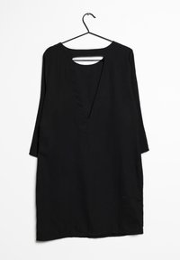 Schwarzes Tunika-Kleid mit tiefem V-Ausschnitt und langen Ärmeln, mit einem Cutout auf der Rückseite. Aus einem glatten, leichten Stoff gefertigt.