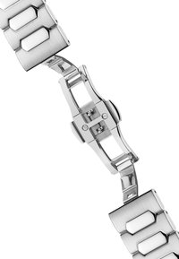 Metalen horlogeband bestaande uit geborstelde en gepolijste roestvrijstalen schakels met witte keramische accenten, met een slank, in elkaar grijpend ontwerp.