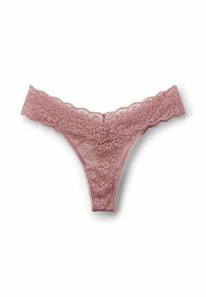 String en dentelle rose poussière, présentant des motifs floraux, des bords festonnés et un tissu transparent pour un look délicat avec un design minimaliste.