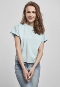 Urban Classics LADIES SHORT PIGMENT DYE CUT ON SLEEVE TEE - T-Shirt basic - seablue