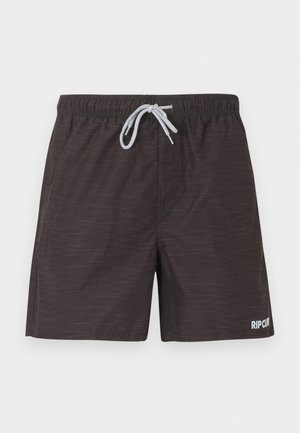 Bañador negro con cintura elástica, cordón blanco, textura sutil y pequeño logotipo "RIP CURL" en la parte inferior derecha de la pierna.