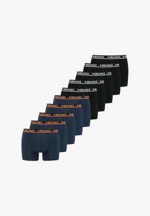 Fünf Paar marineblaue Boxershorts mit orangefarbenen "HEAD" Taillenbändern und fünf Paar schwarze Boxershorts mit weißen "HEAD" Taillenbändern, angeordnet in zwei Reihen.