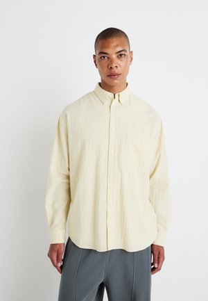 Weekday OVERSIZED SHIRT - Shirt - yellow light