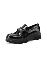 Mocassino in pelle verniciata nera con suola spessa nera, cinturino decorativo con strass e una finitura liscia e lucida.