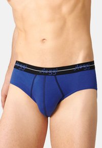 Blaue Baumwollunterwäsche mit schwarzem Gummibund, ausgestattet mit weißem Logo, gestickten Details und einem körpernahen Design für Komfort.