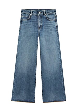 Jean large bleu clair en denim avec taille haute, comportant cinq poches, des coutures contrastantes et un ourlet effiloché à la base.