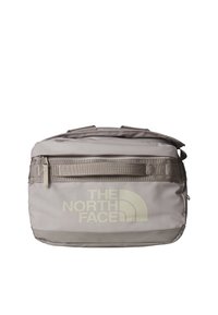 Gray fabric duffel bag with textured surface; features a front logo and sturdy overhead straps, complemented by a side zippered pocket.