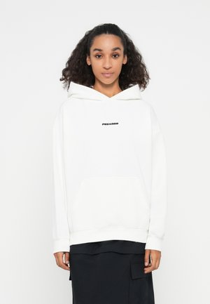 Weißer Hoodie mit einer Fronttasche und einer Kapuze. Verfügt über ein schwarzes "PEGADOR" Textlogo auf der Brust. Weicher Stoff, lockere Passform.
