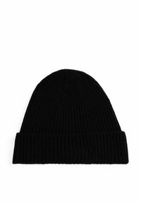 Black knitted beanie with a ribbed texture, featuring a folded cuff and tapered top. Made of soft, flexible material.