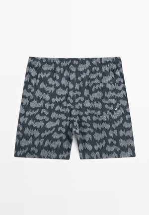 Shorts de bain noirs pour hommes avec un motif abstrait gris clair irrégulier et une taille élastique.