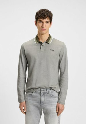 Long-sleeve grey polo shirt with a green collar and white accent. Features a three-button placket and a small logo on the chest.