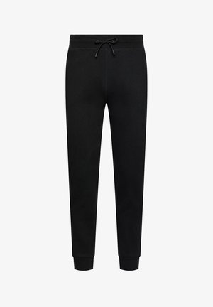 Pantalons de survêtements noirs en tissu doux, avec une taille élastique dotée d'un cordon de serrage, des chevilles resserrées et une texture lisse.